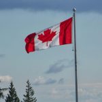 Canadian flag representing mental health care access challenges and telehealth services in Canada.